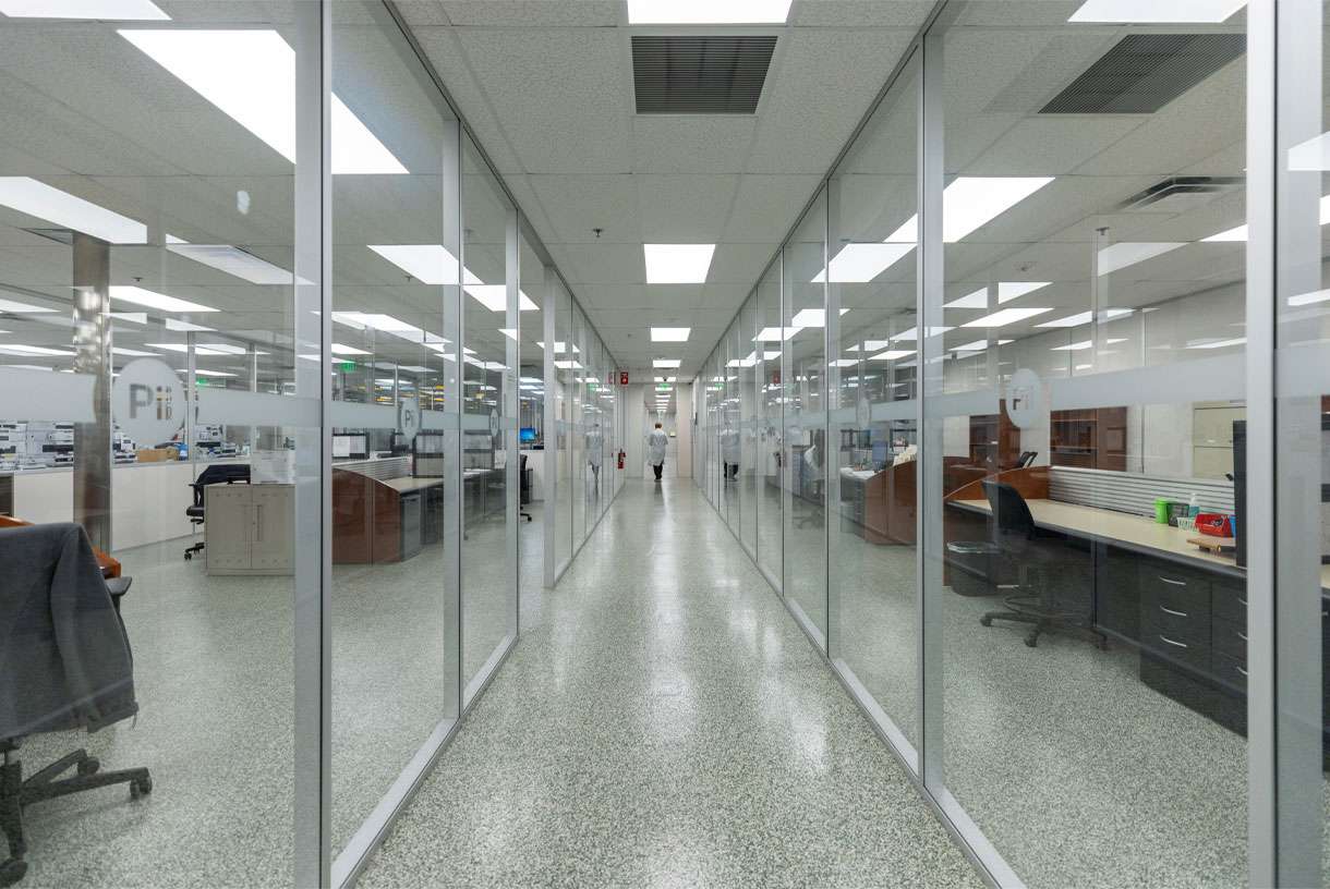 Large clean Pii lab space with see-through glass hallways.